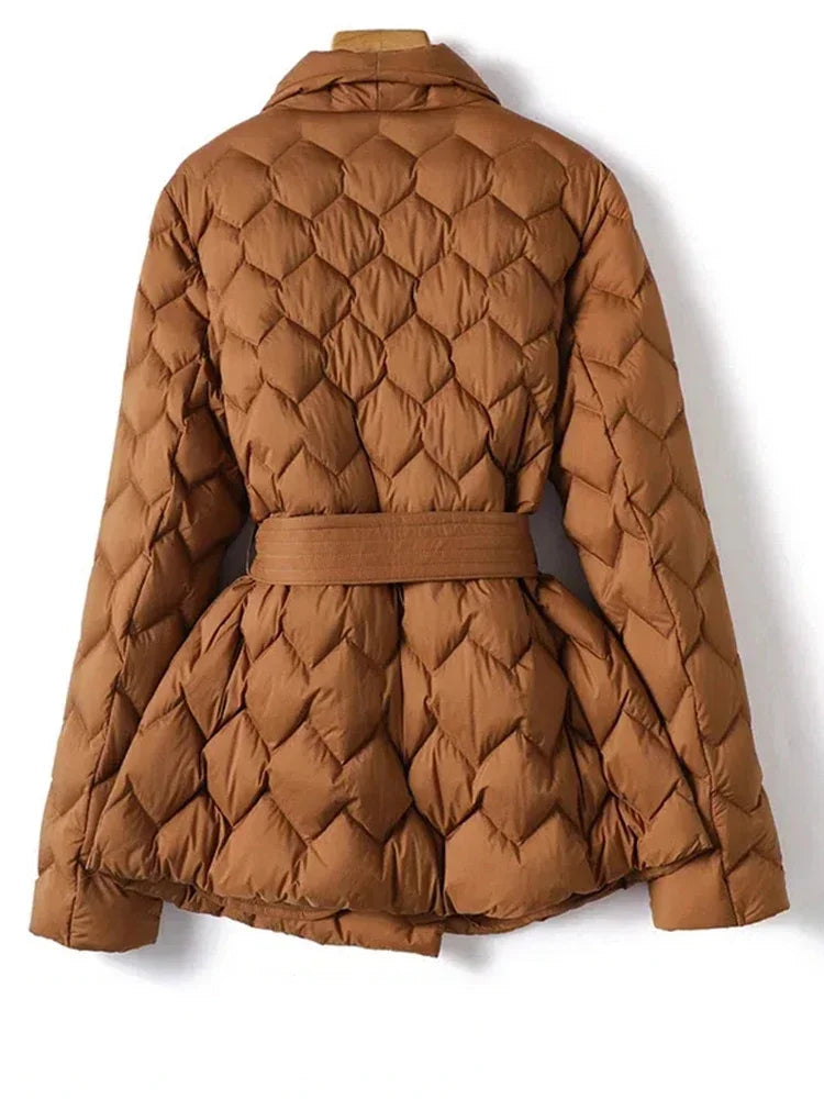 Harper - Quilted jacket with belt and elegant stitching