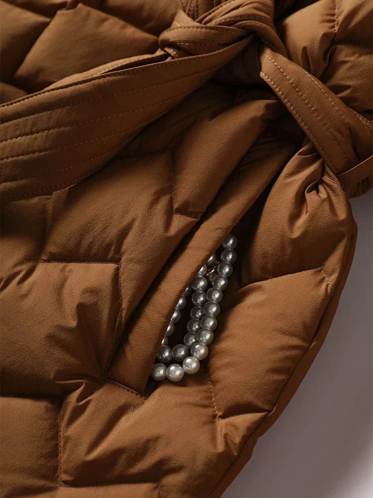 Harper - Quilted jacket with belt and elegant stitching
